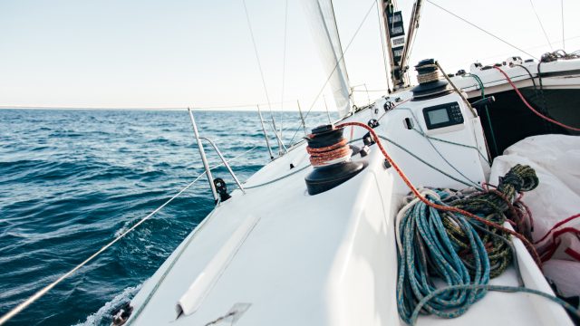 Deck of professional racing yacht leaning in wind